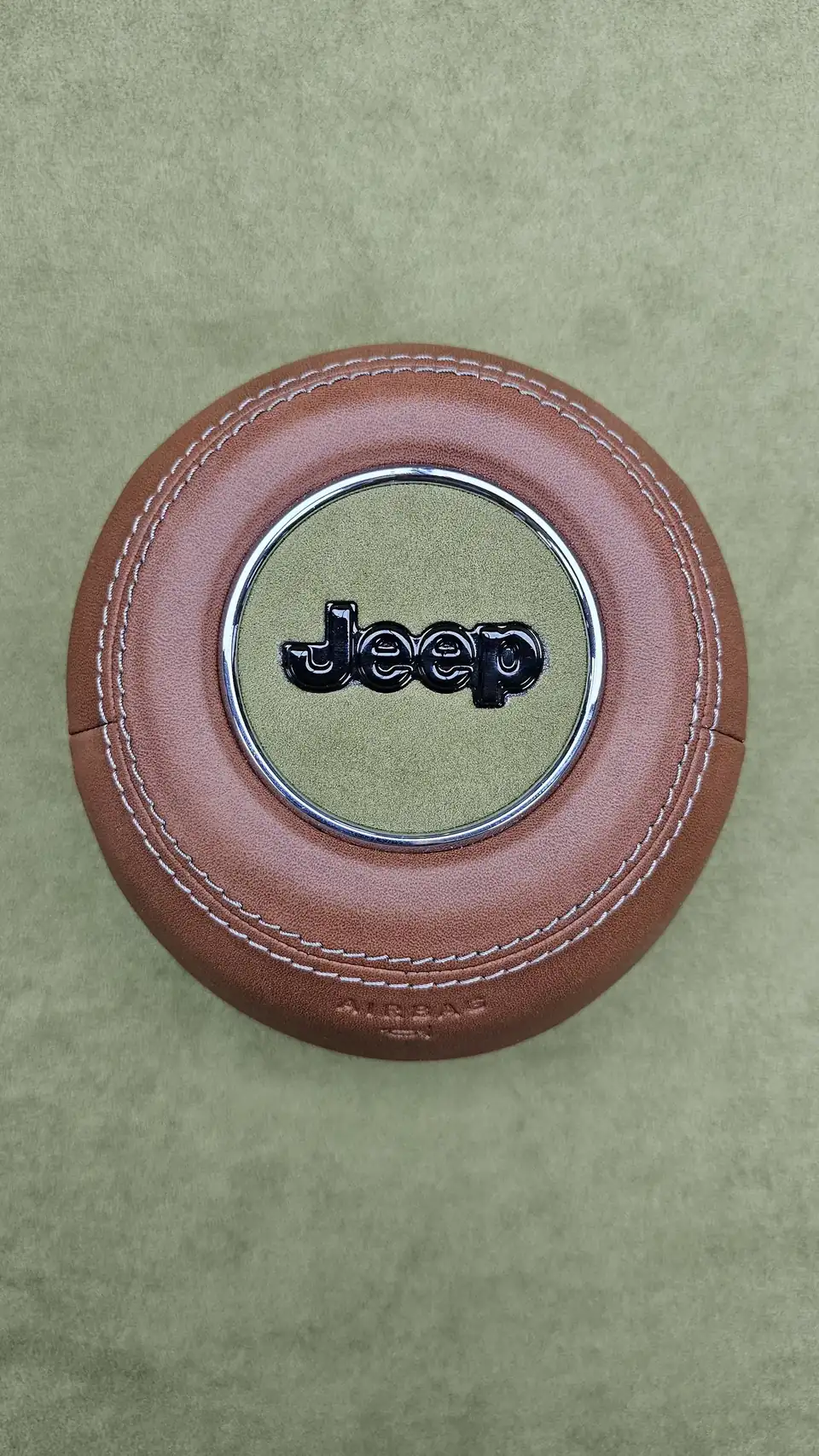 Airbag cover with topographic stitching, Jeep Wrangler
